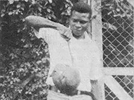 Sunday Ajayi handling an African giant rat.